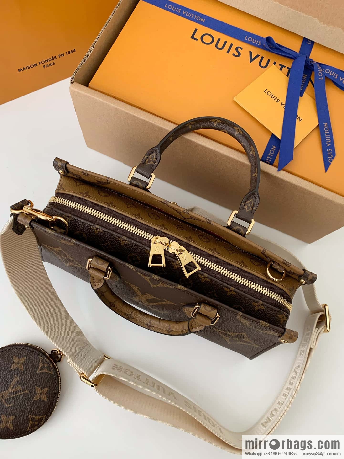 LV M46653 OnTheGo East West