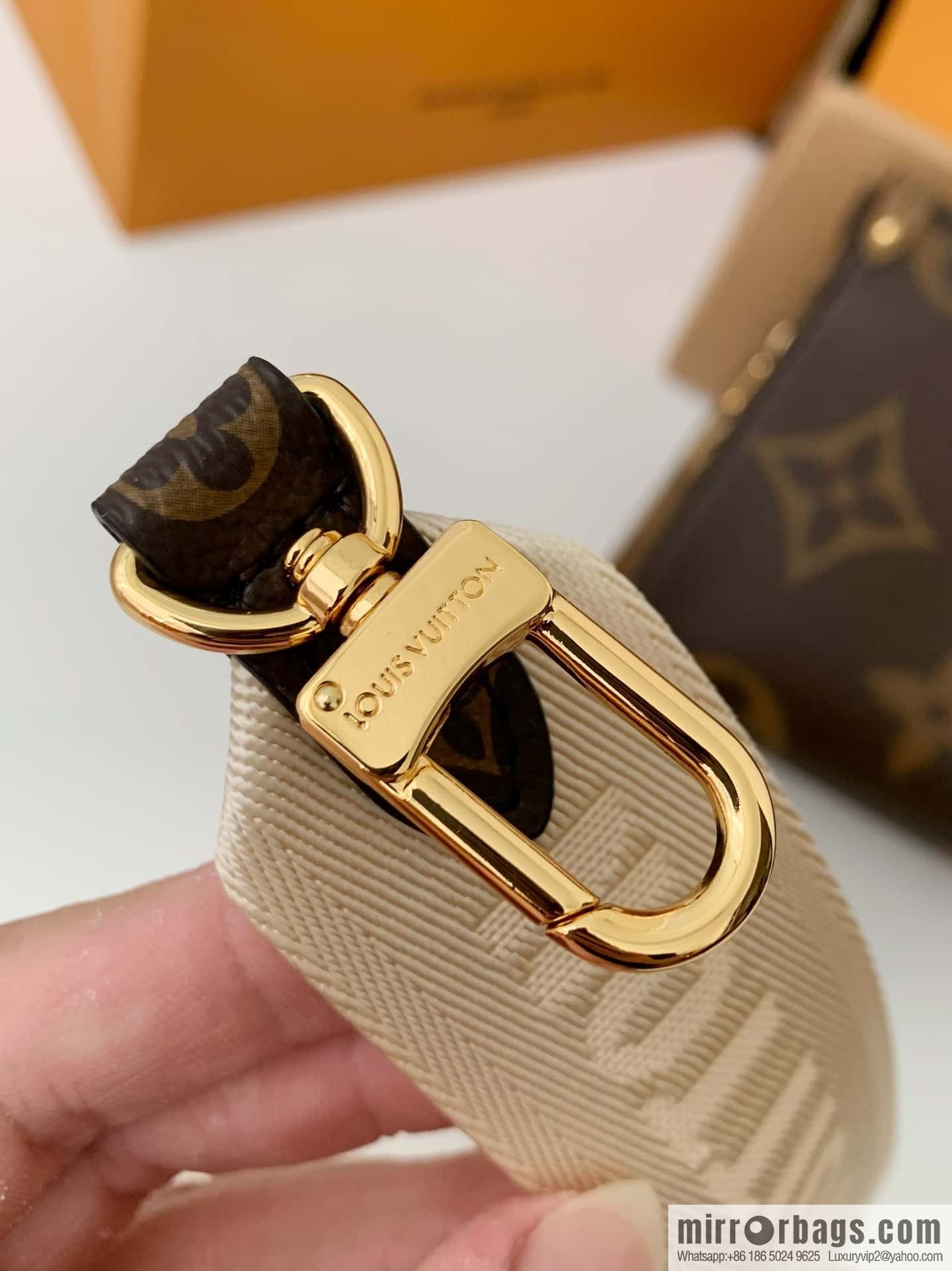 LV M46653 OnTheGo East West