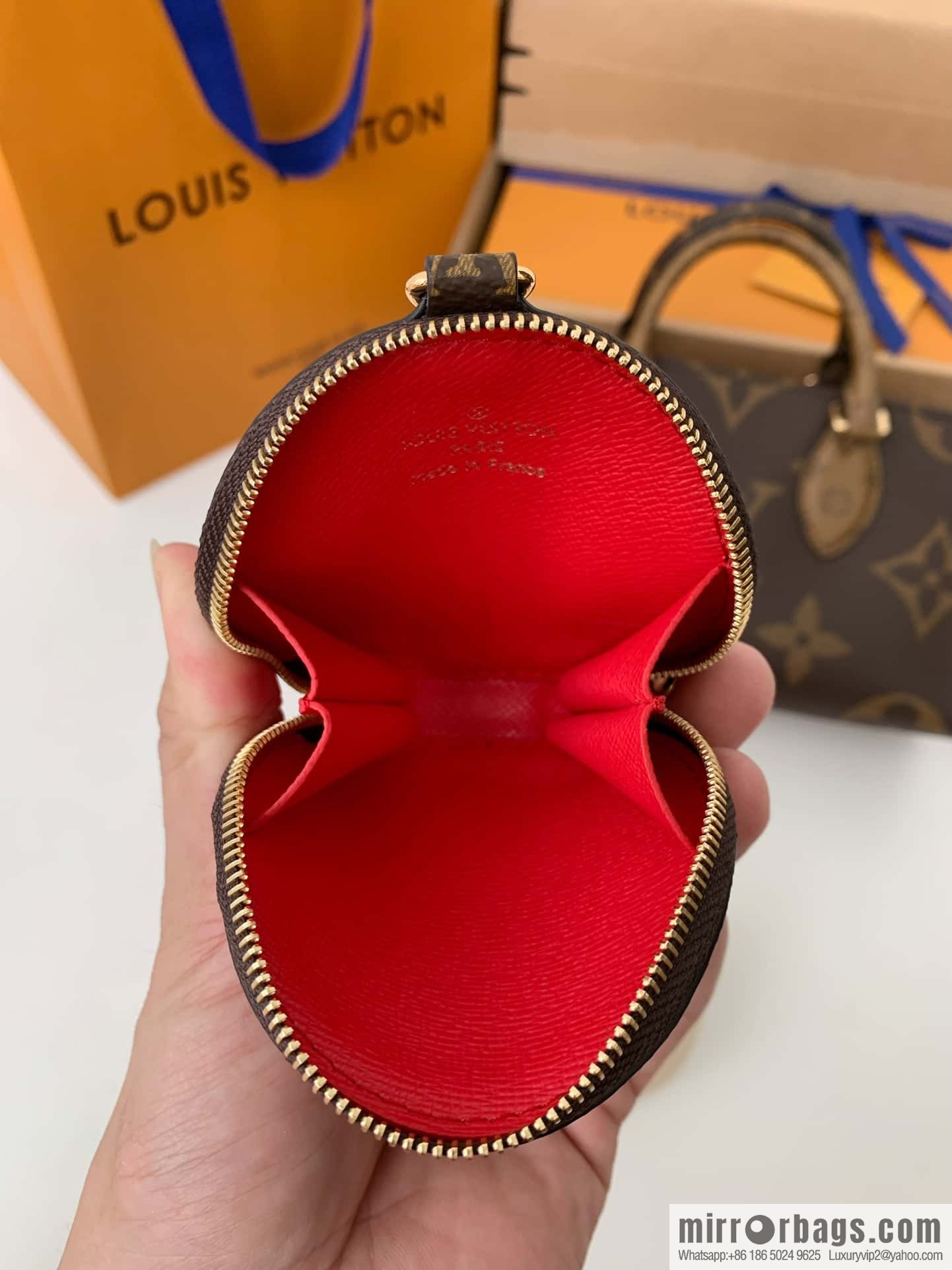 LV M46653 OnTheGo East West