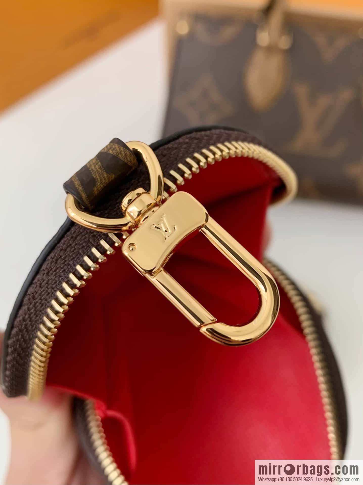 LV M46653 OnTheGo East West