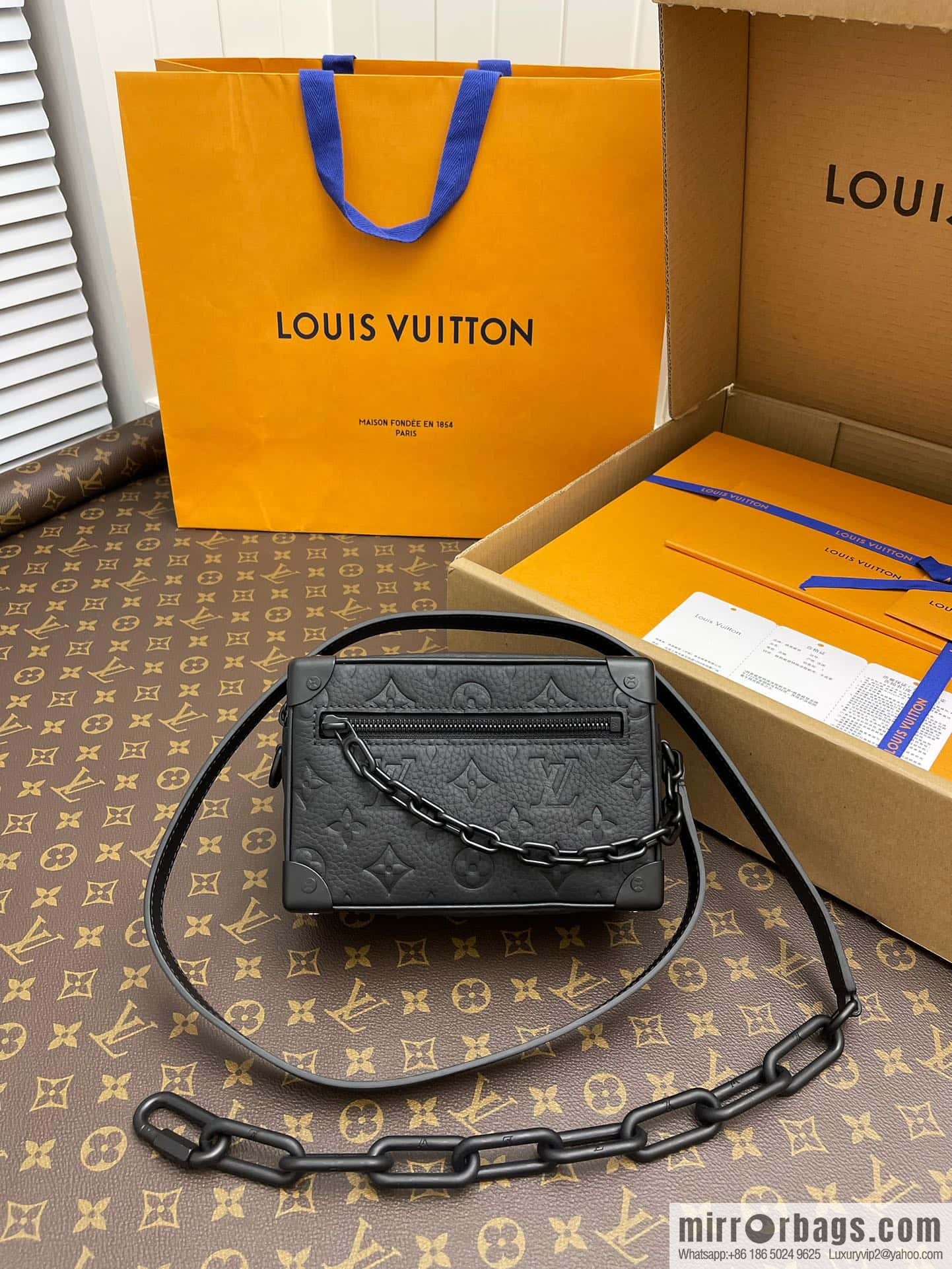 LV M55702 Mini Soft Trunk