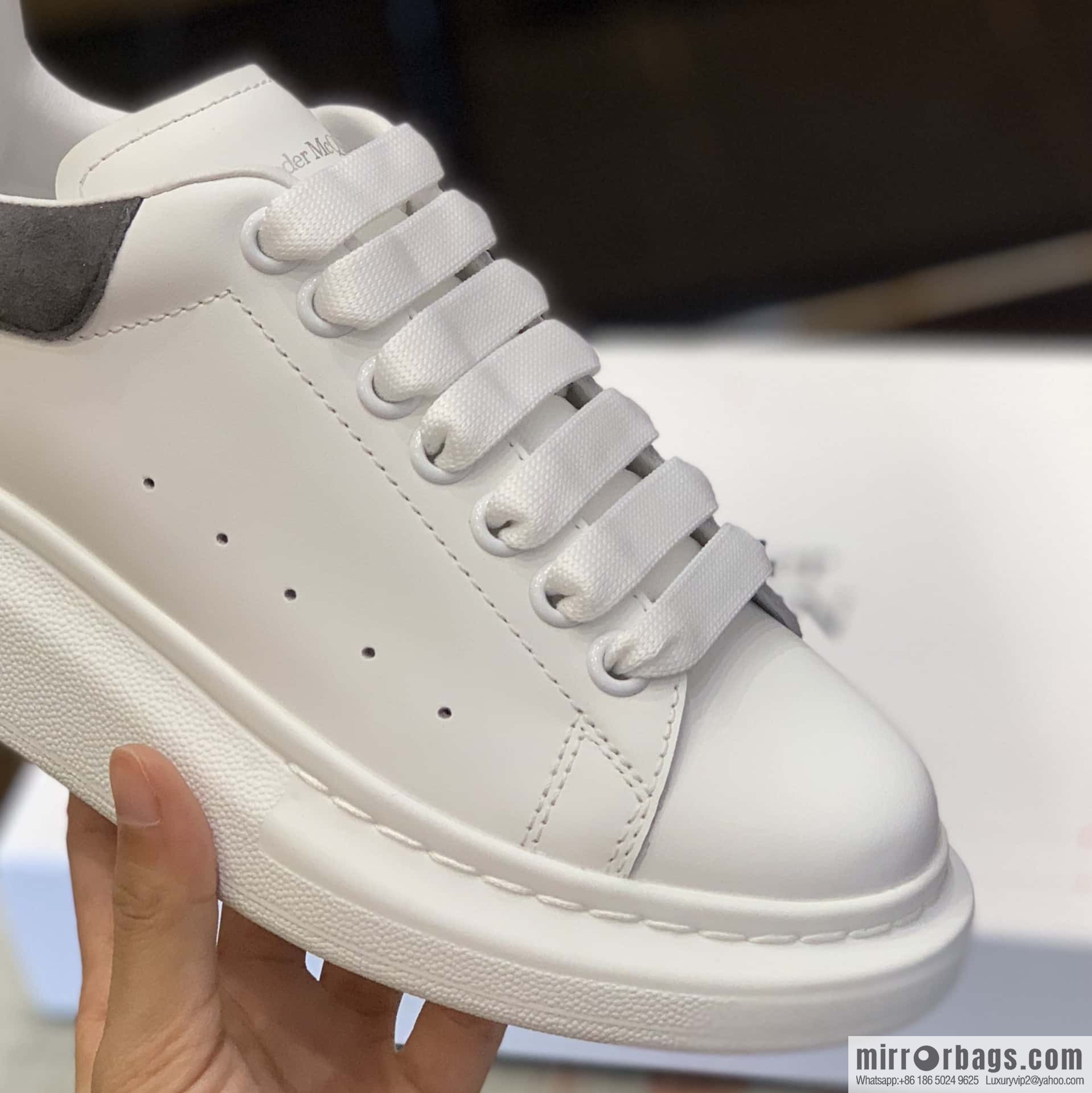 Alexander McQueen Alexander McQueen Dark Grey Fleece Tail Unisex Sneakers