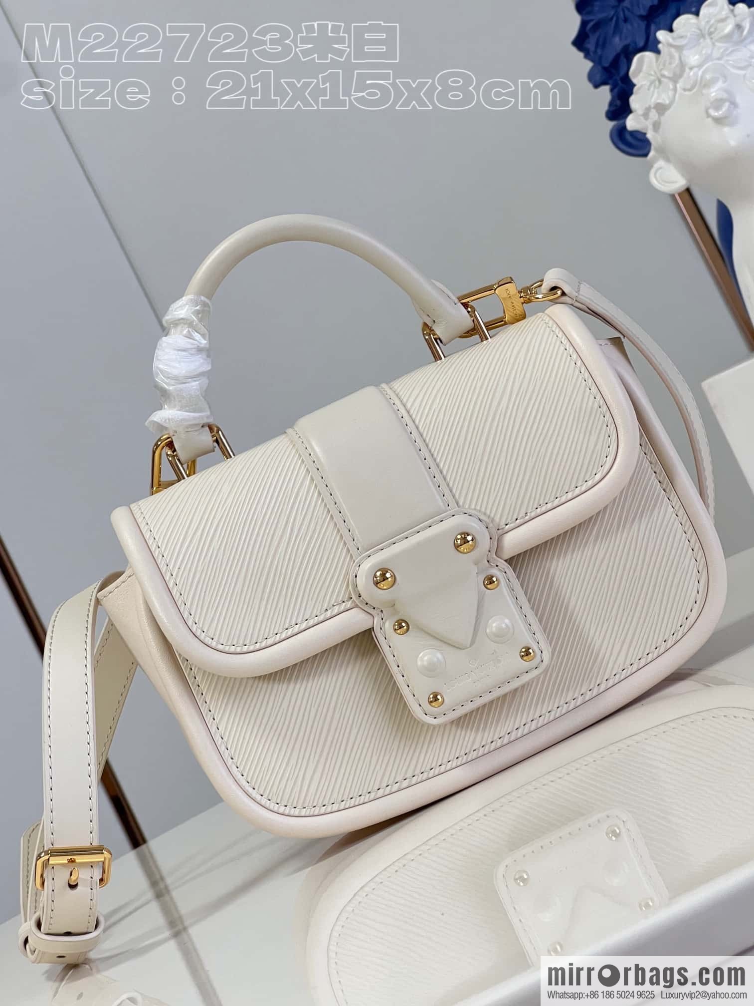 LV M22720 HIDE AND SEEK BAG