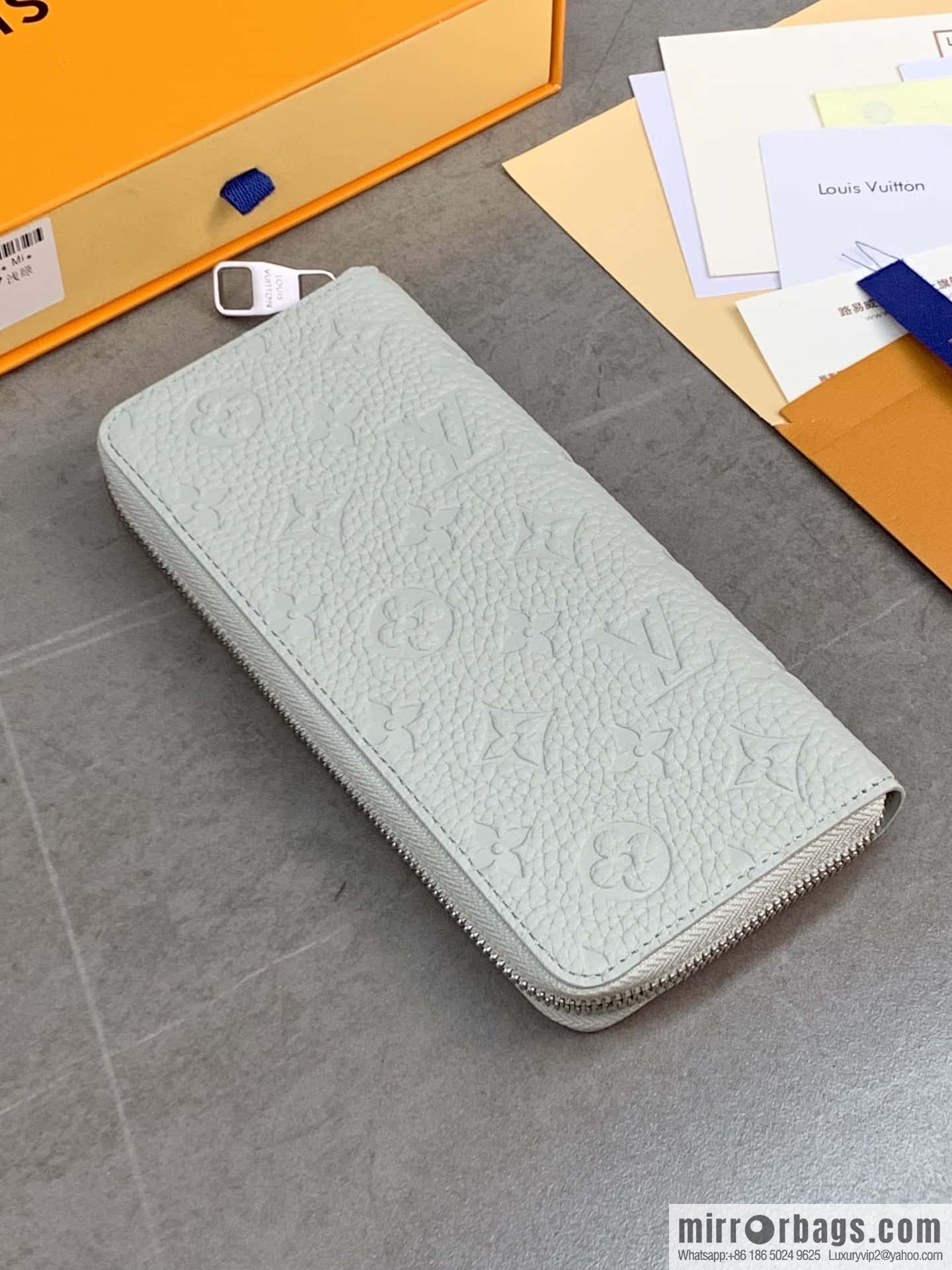 LV M82597 Zippy Vertical Wallet