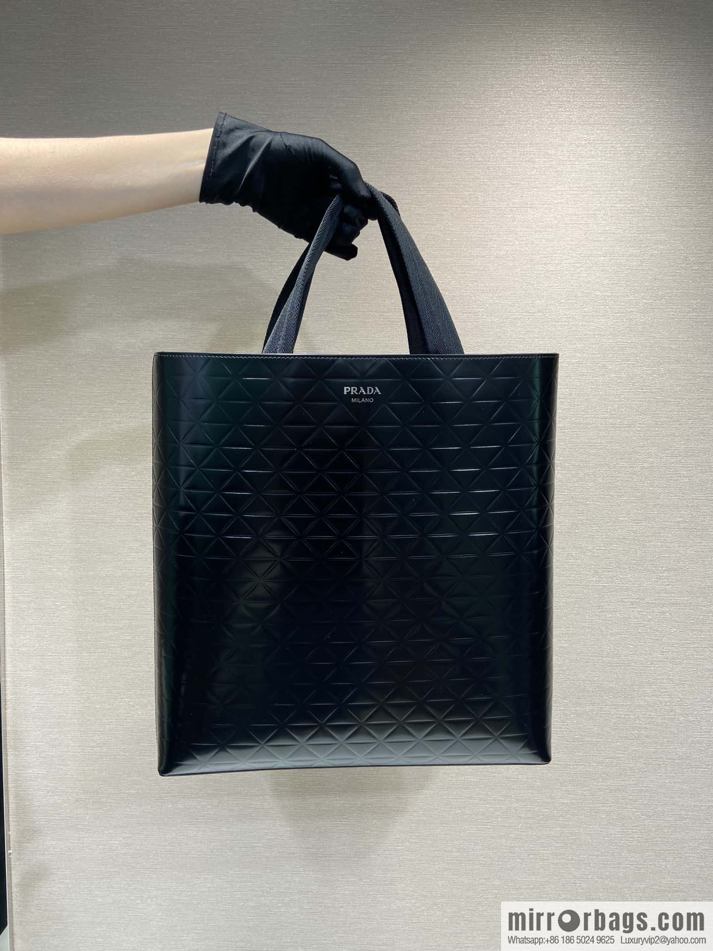 PRADA vertical embossed tote bag 2VG113