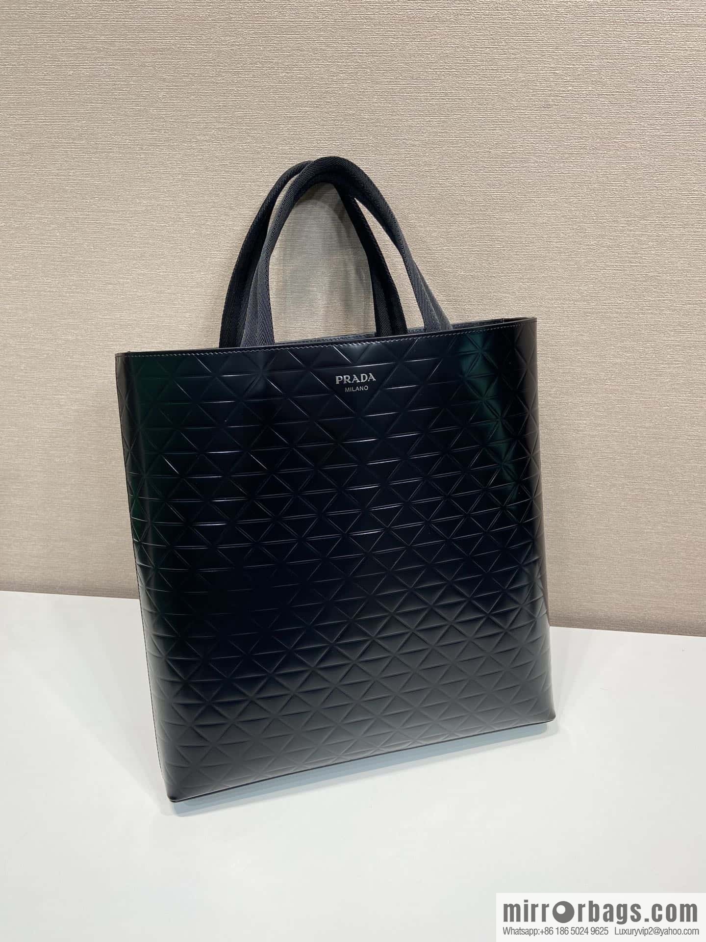 PRADA vertical embossed tote bag 2VG113