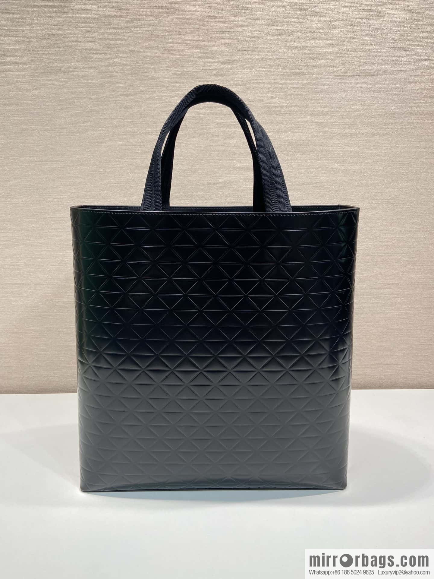 PRADA vertical embossed tote bag 2VG113