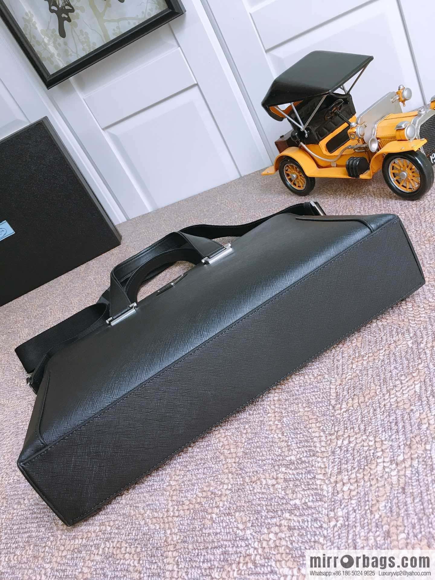 PRADA imported cross pattern leather briefcase