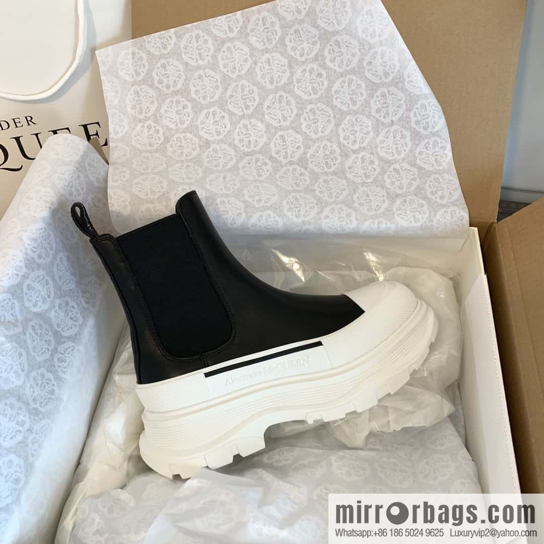 Alexander McQueen, platform black and white Chelsea booties