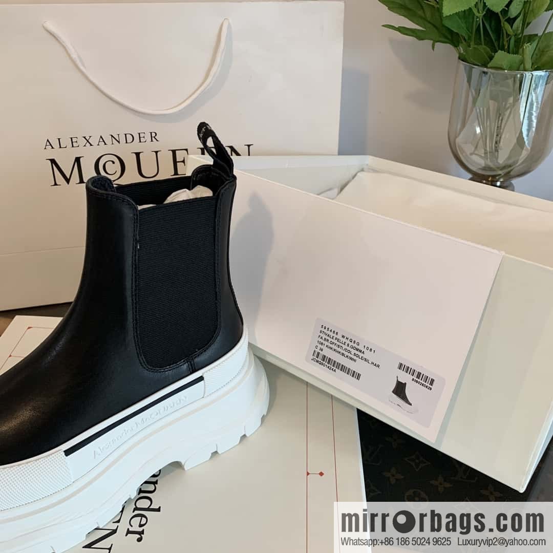 Alexander McQueen, platform black and white Chelsea booties