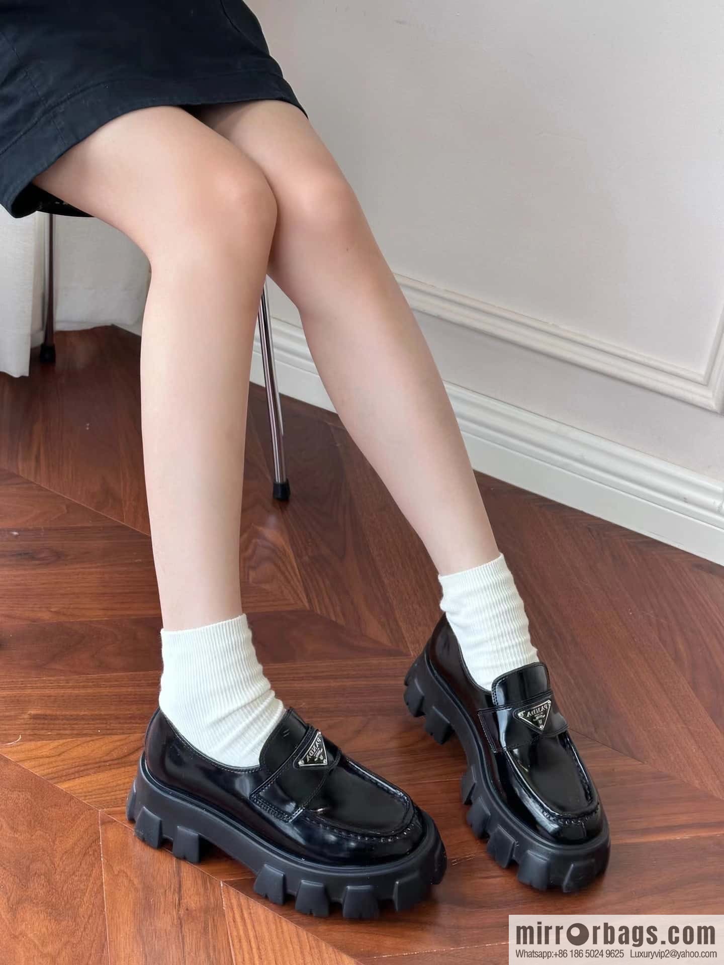 PRADA Prada, triangular label, serrated wheel muffin platform loafers 1D246M