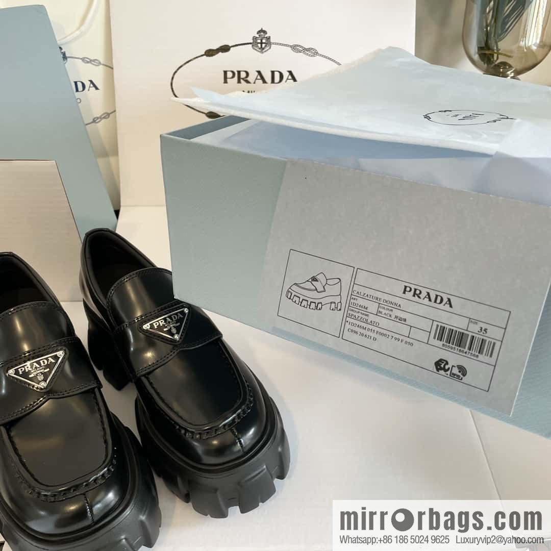 PRADA Prada, triangular label, serrated wheel muffin platform loafers 1D246M