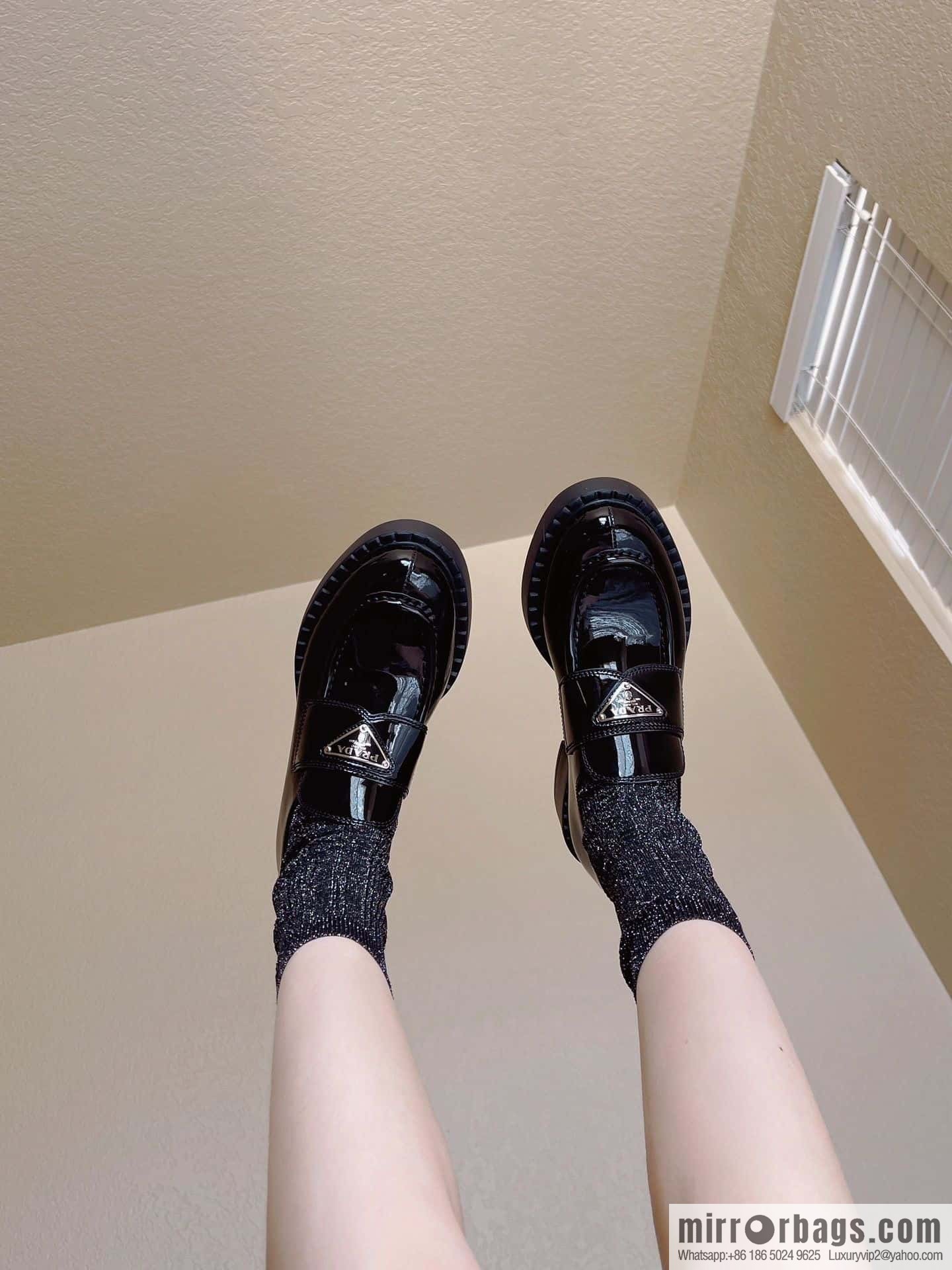 Prada, Puhada glossy patent leather triangle loafers