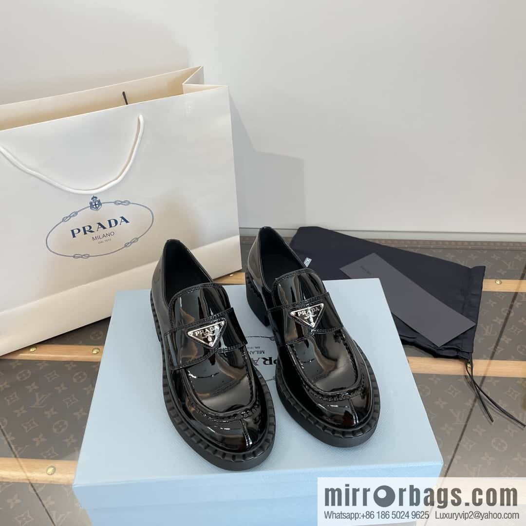 Prada, Puhada glossy patent leather triangle loafers