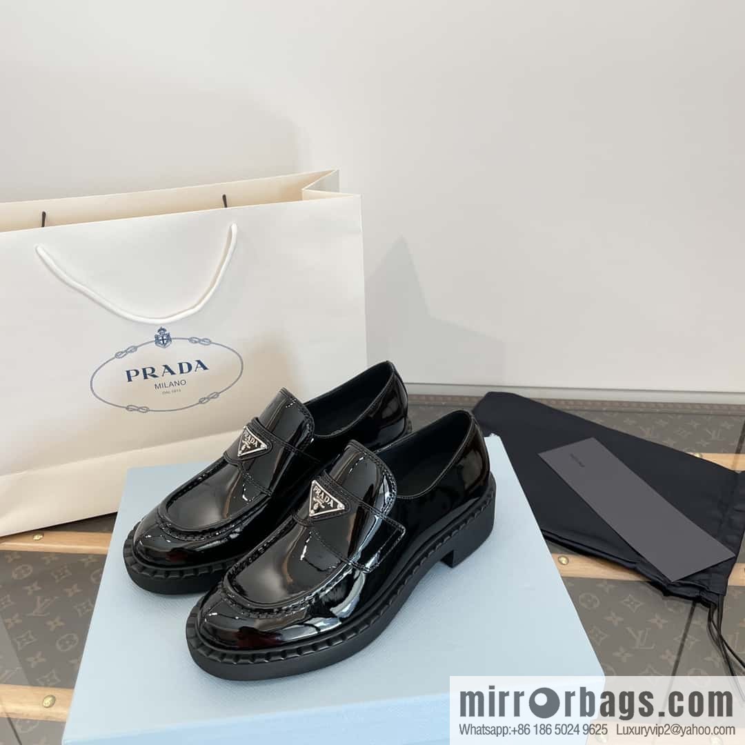 Prada, Puhada glossy patent leather triangle loafers
