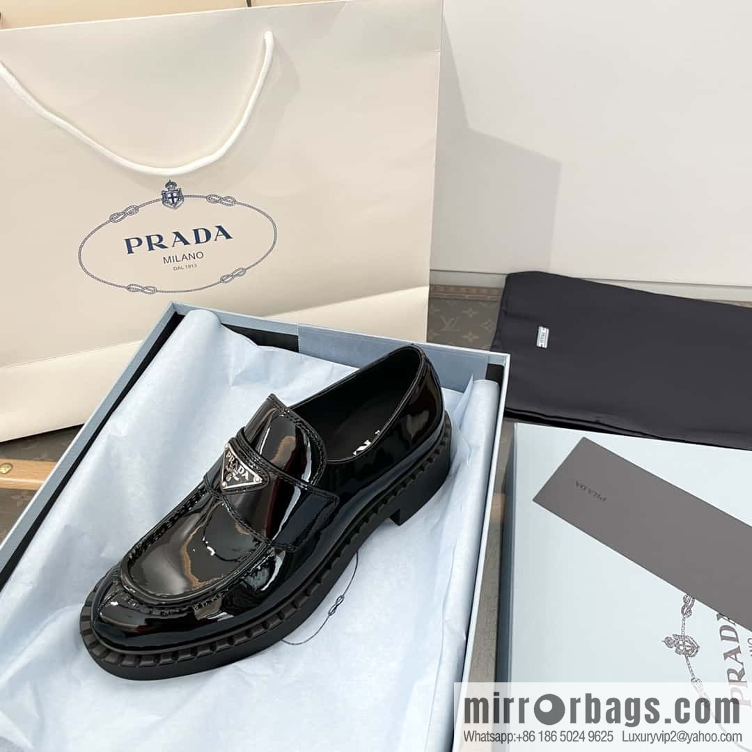 Prada, Puhada glossy patent leather triangle loafers