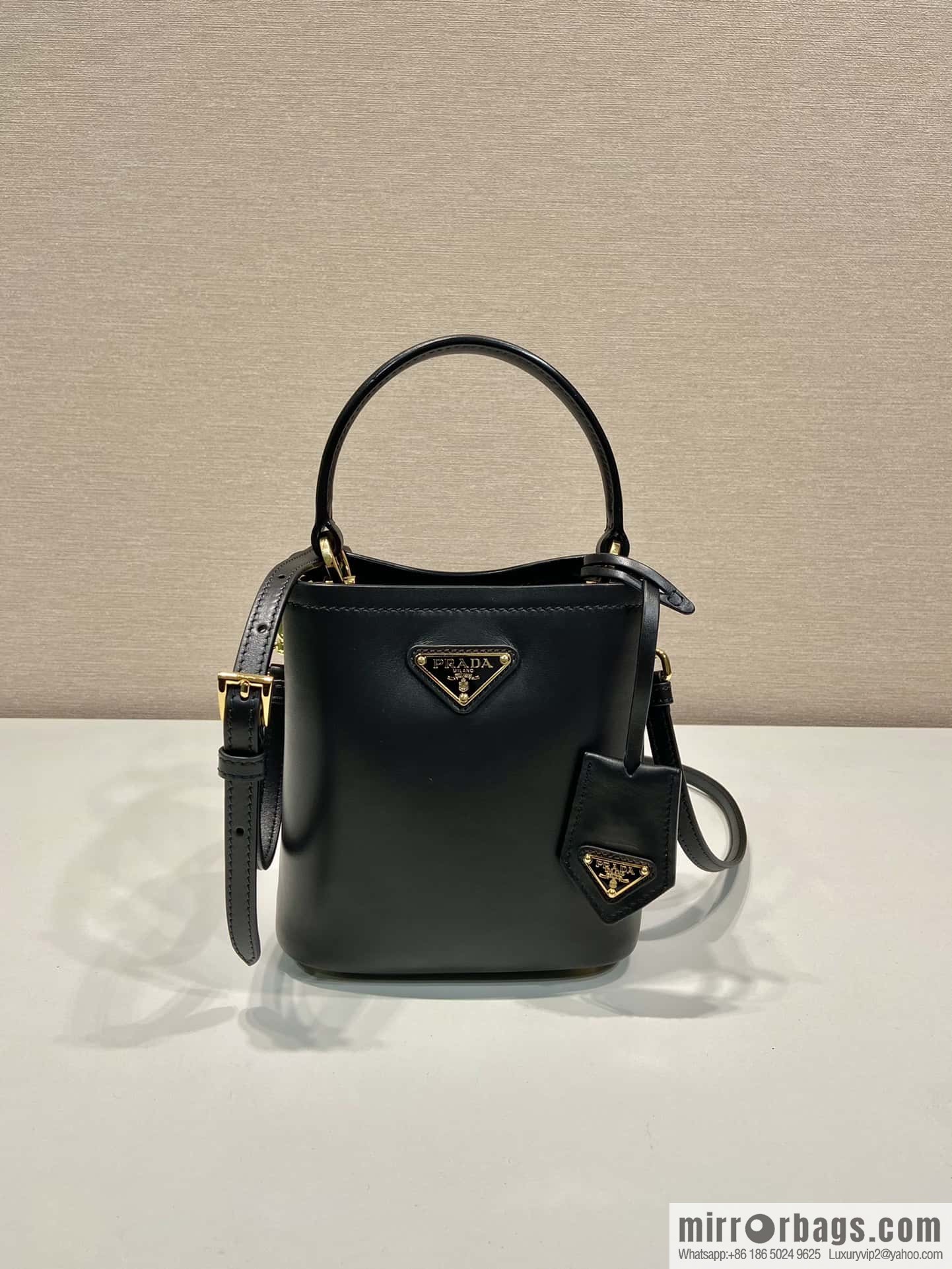 PRTADA Prada calfskin leather (fabric) bucket bag 1BA373