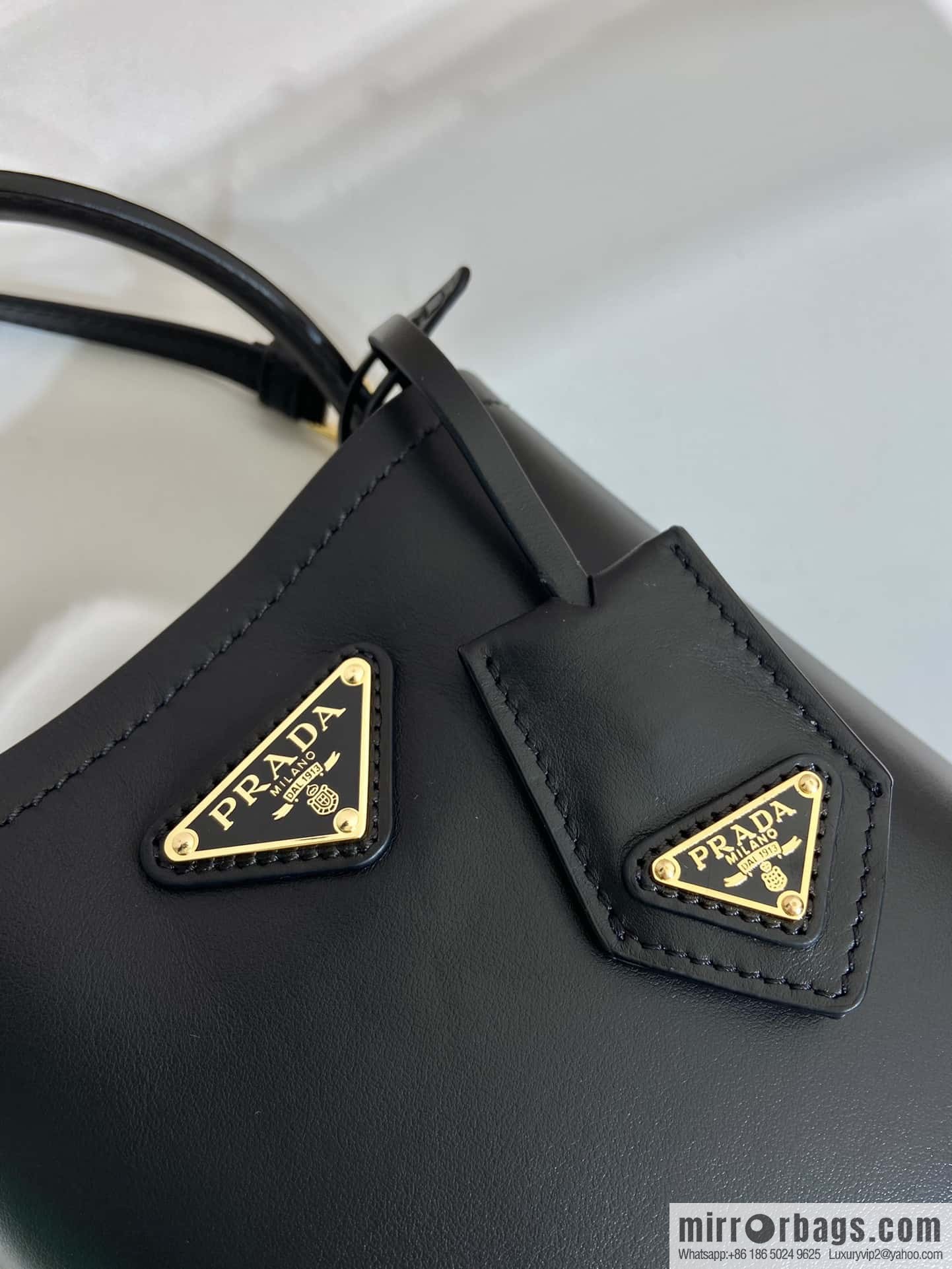 PRTADA Prada calfskin leather (fabric) bucket bag 1BA373