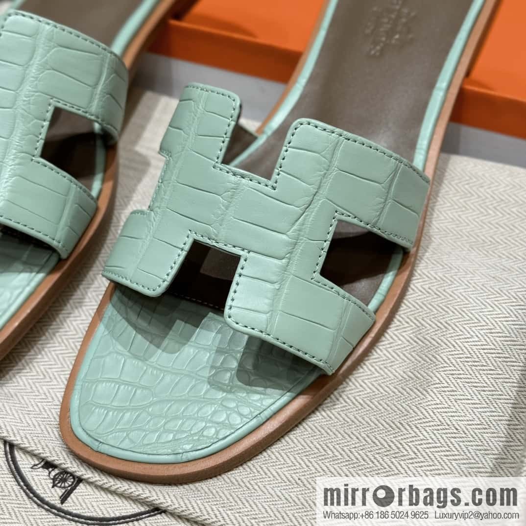 Hermès crocodile slippers
