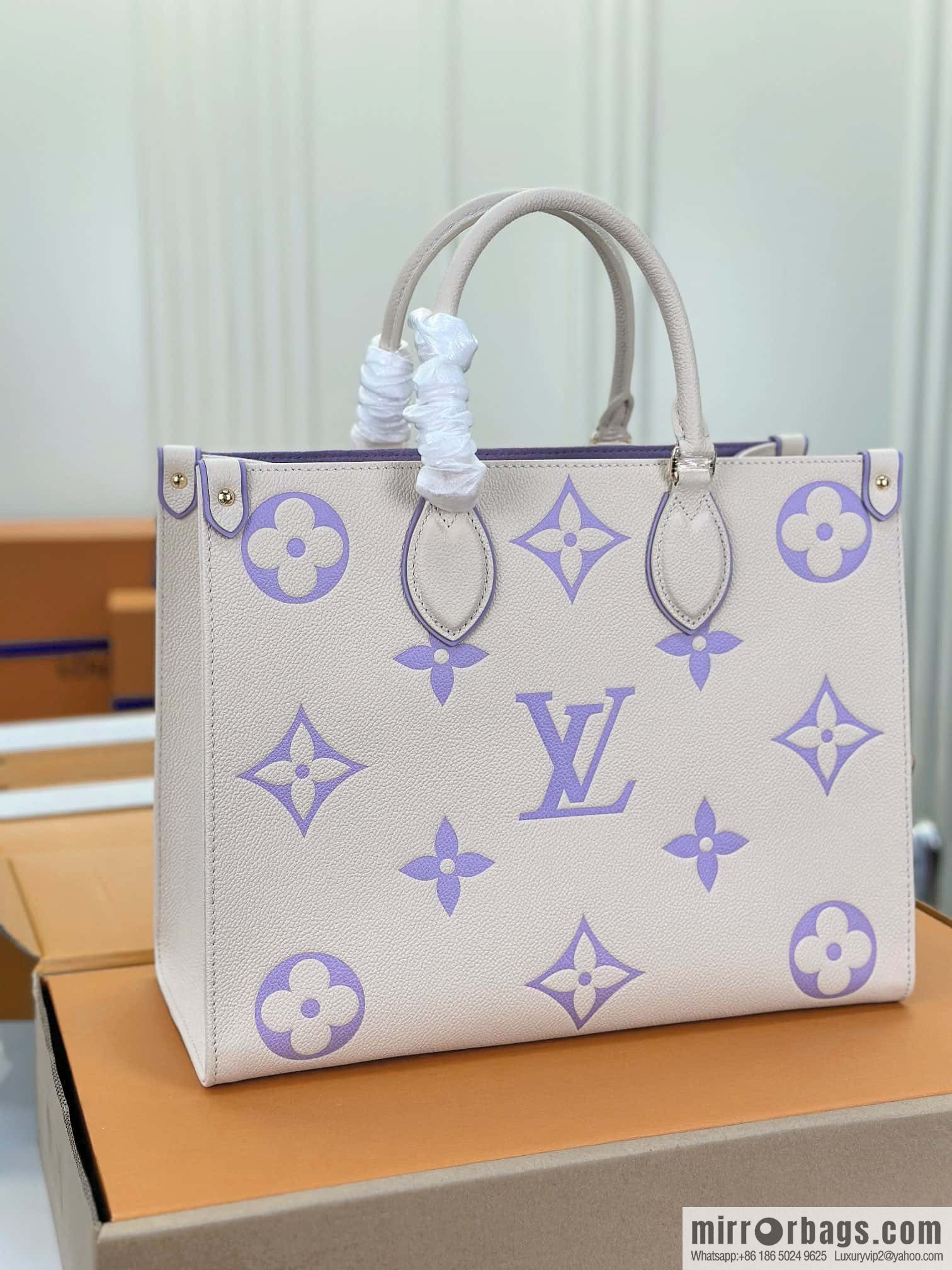 LV M23937 OnTheGo MM