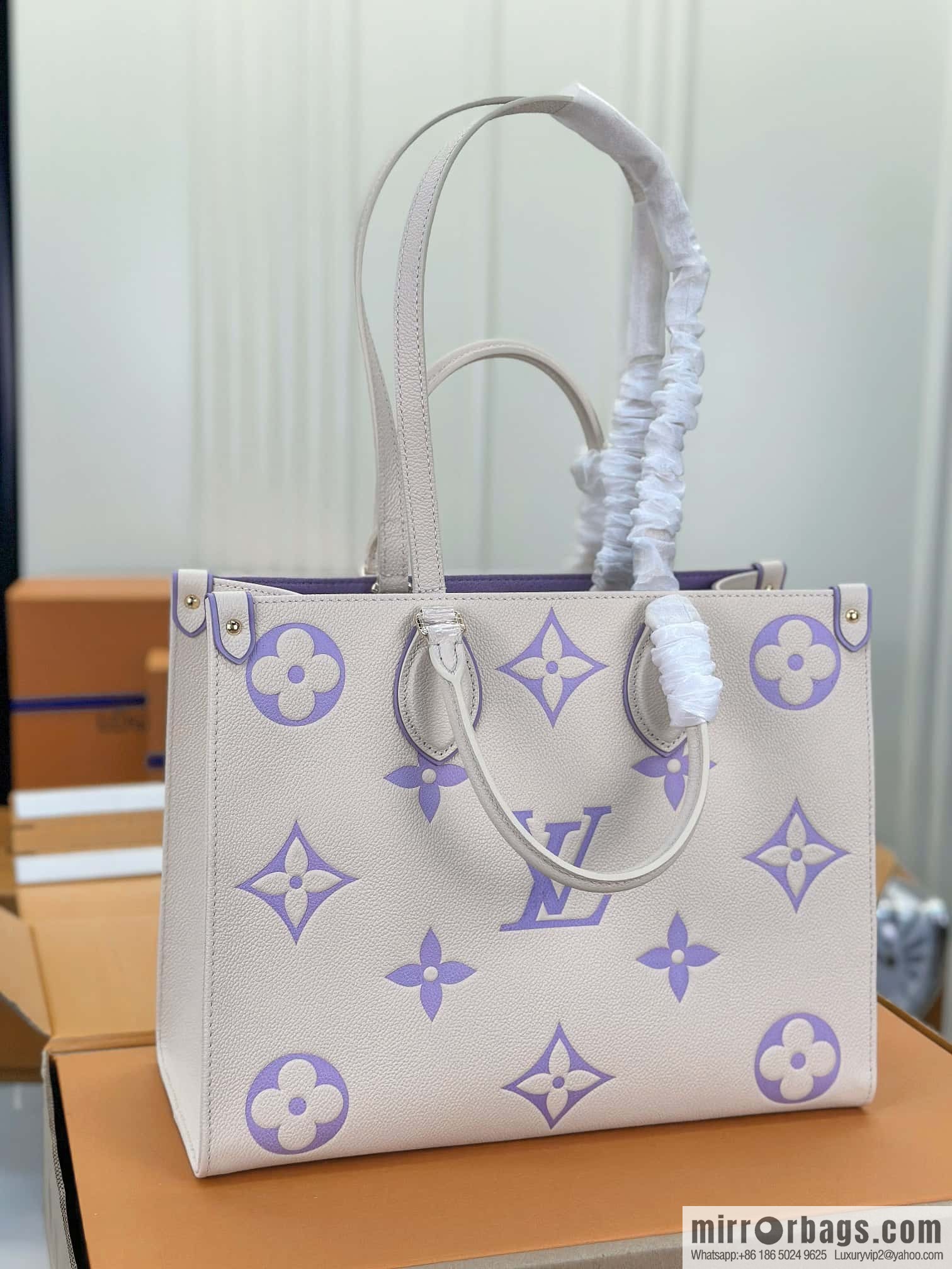 LV M23937 OnTheGo MM