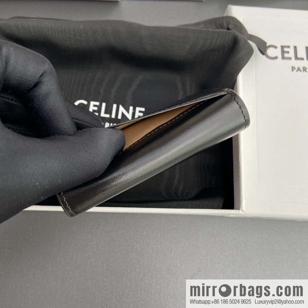 Celine TRIOMPHE shiny cow leather (fabric) flip card holder 10I582CPJ.04LU
