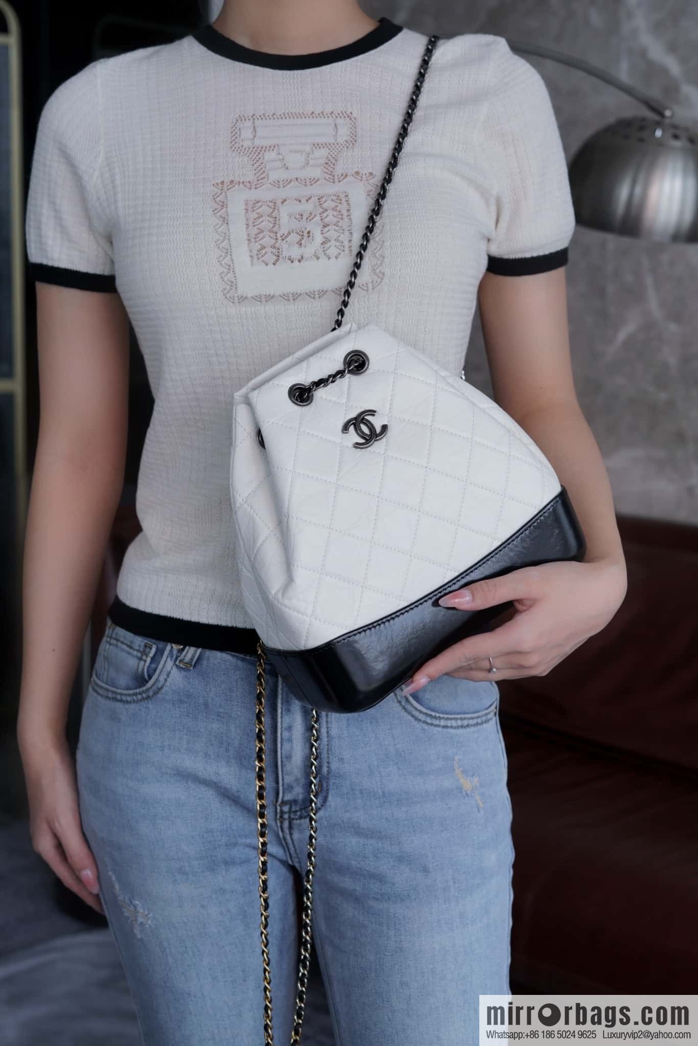 ๐๐ต๐ฎ๐ป๐ฒ๐น ๐๐ฎ๐ฏ๐ฟ๐ถ๐ฒ๐น๐น๐ฒ stray backpack, black and white ๐ A94485