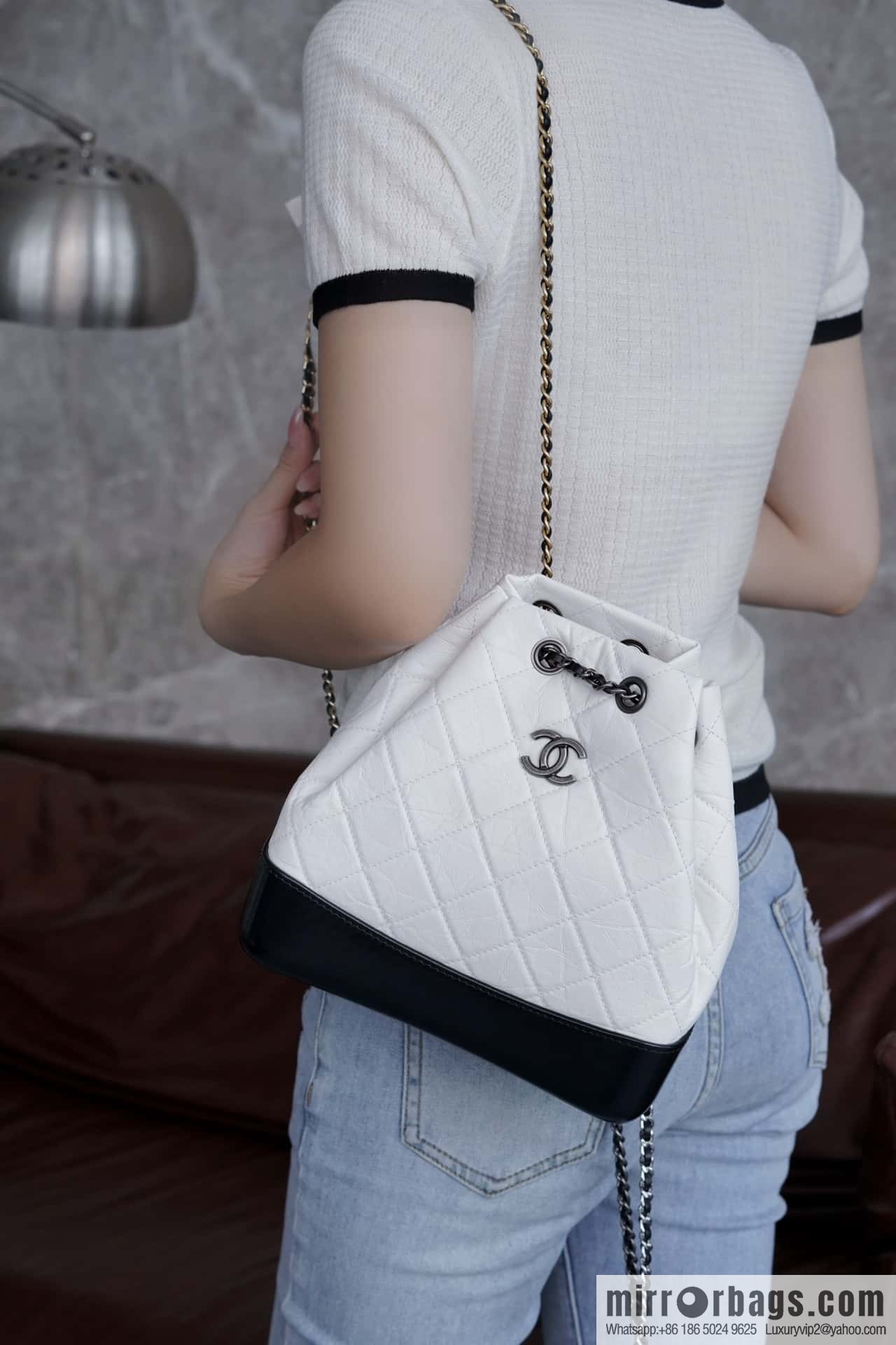 ๐๐ต๐ฎ๐ป๐ฒ๐น ๐๐ฎ๐ฏ๐ฟ๐ถ๐ฒ๐น๐น๐ฒ stray backpack, black and white ๐ A94485