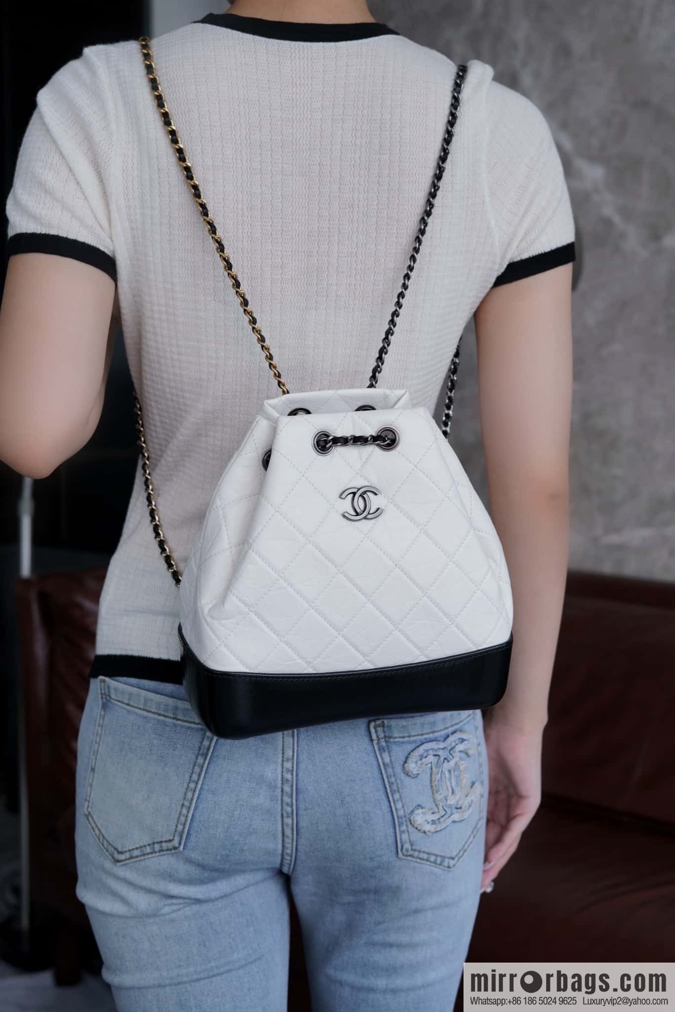 ๐๐ต๐ฎ๐ป๐ฒ๐น ๐๐ฎ๐ฏ๐ฟ๐ถ๐ฒ๐น๐น๐ฒ stray backpack, black and white ๐ A94485