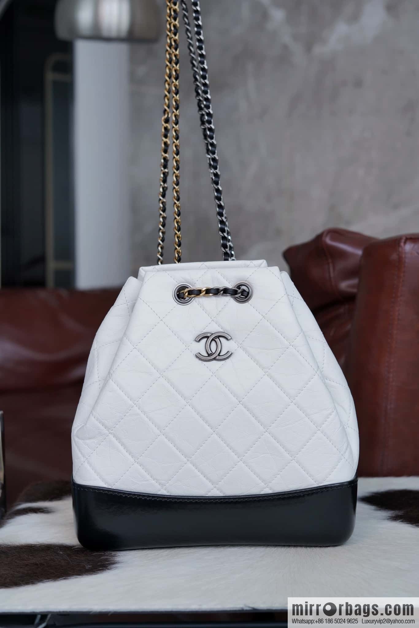 ๐๐ต๐ฎ๐ป๐ฒ๐น ๐๐ฎ๐ฏ๐ฟ๐ถ๐ฒ๐น๐น๐ฒ stray backpack, black and white ๐ A94485