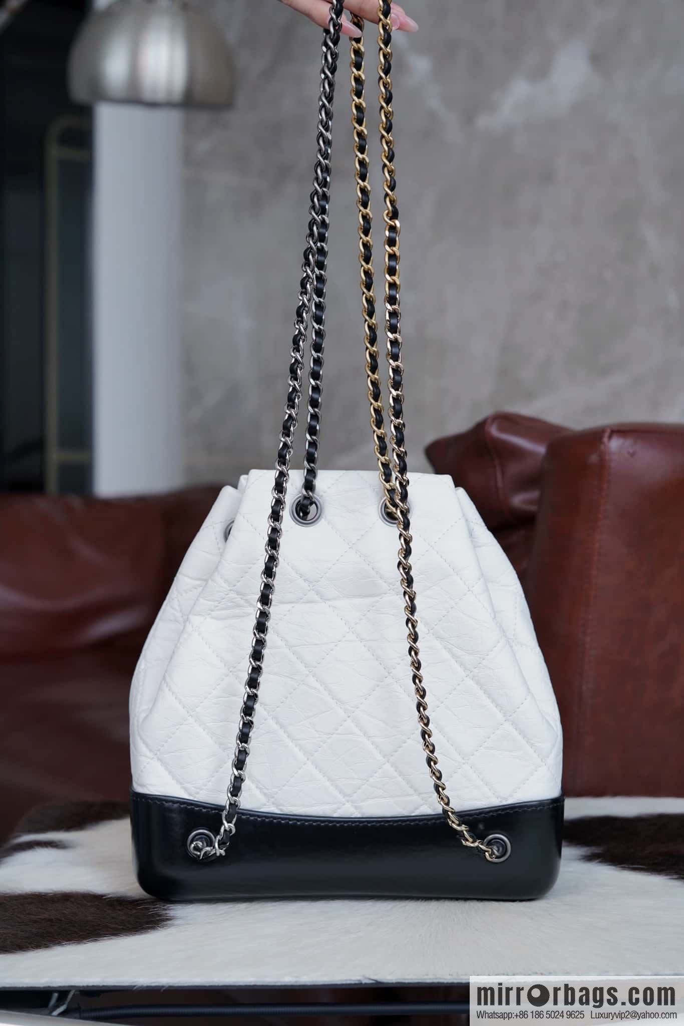 ๐๐ต๐ฎ๐ป๐ฒ๐น ๐๐ฎ๐ฏ๐ฟ๐ถ๐ฒ๐น๐น๐ฒ stray backpack, black and white ๐ A94485