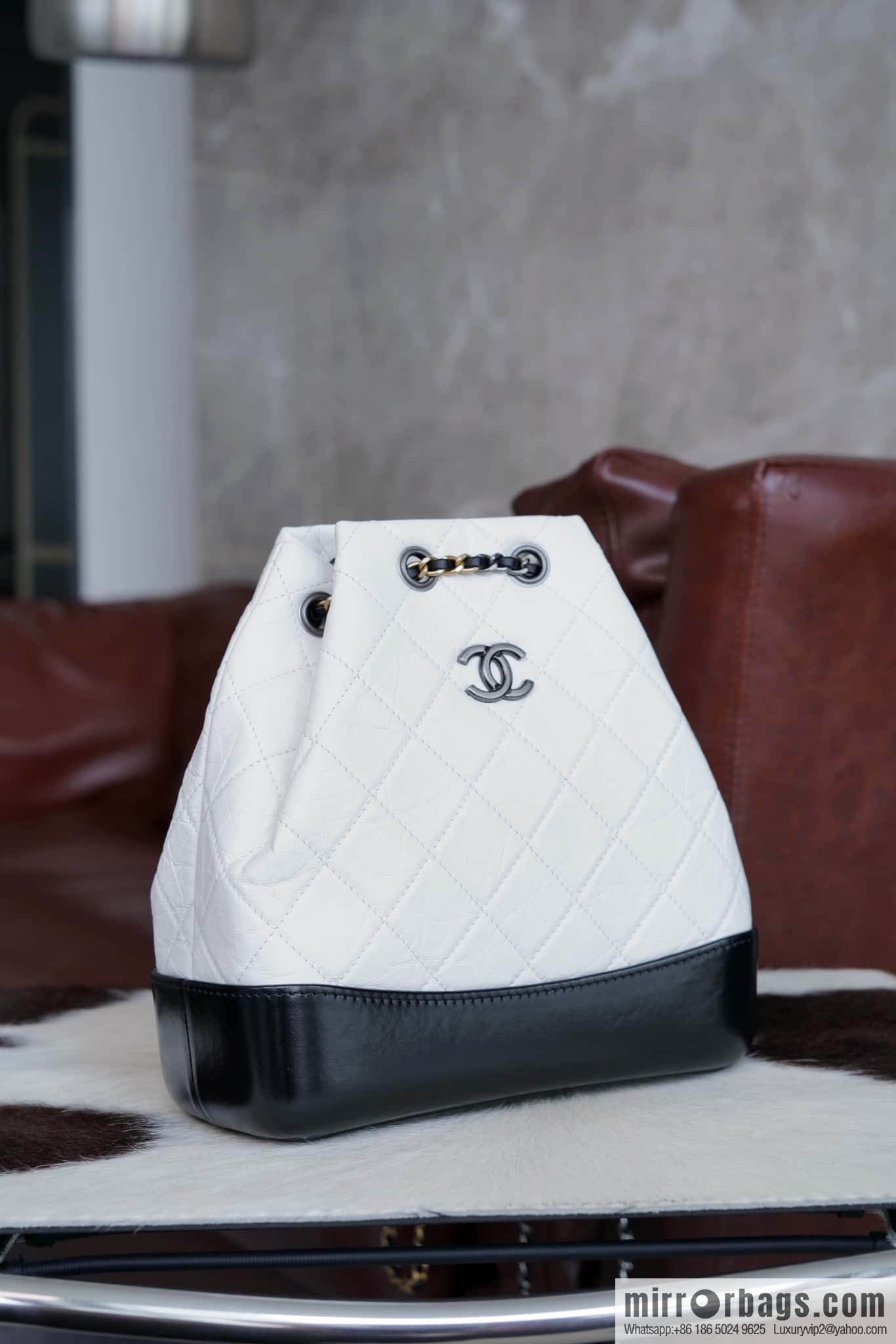 ๐๐ต๐ฎ๐ป๐ฒ๐น ๐๐ฎ๐ฏ๐ฟ๐ถ๐ฒ๐น๐น๐ฒ stray backpack, black and white ๐ A94485