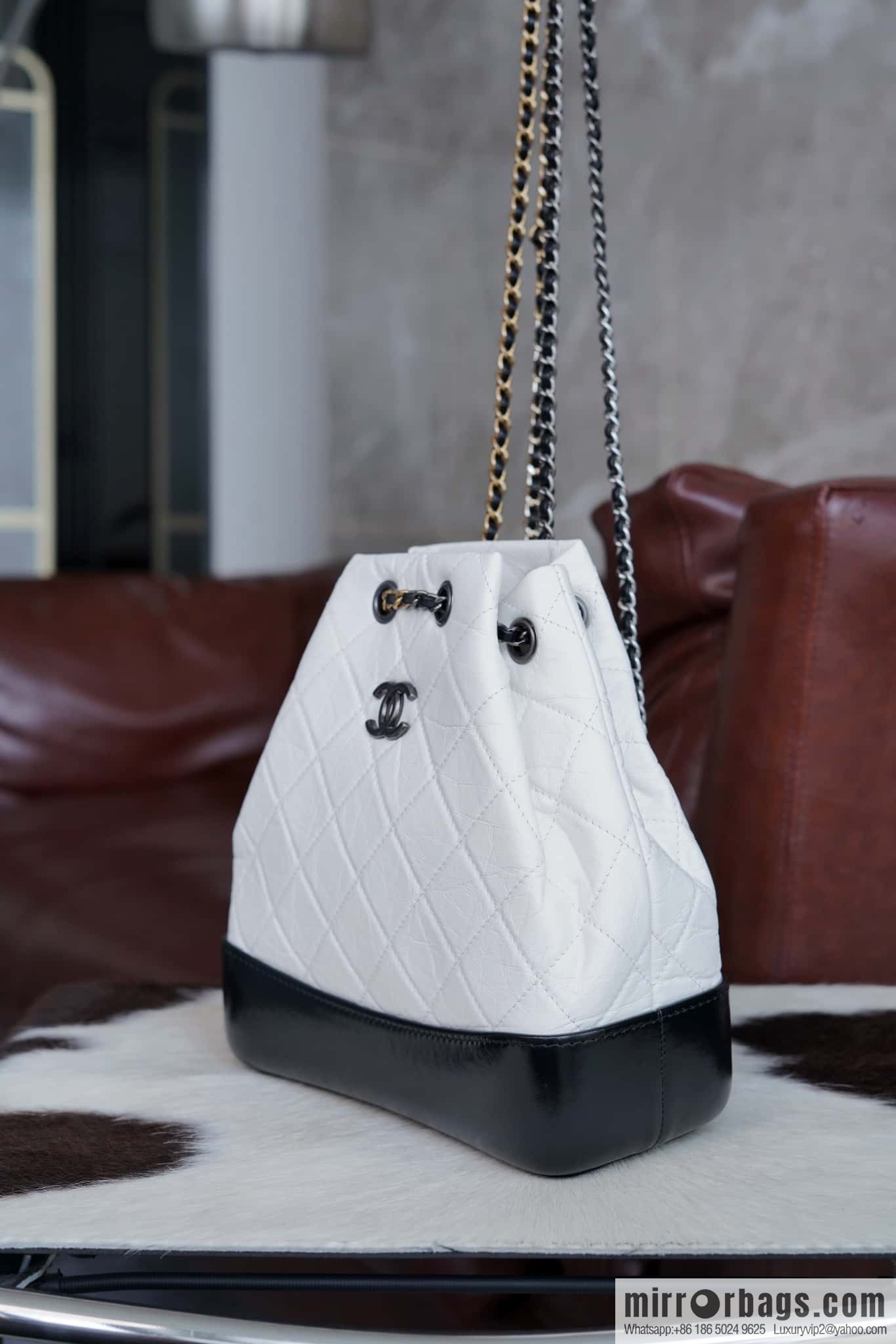 ๐๐ต๐ฎ๐ป๐ฒ๐น ๐๐ฎ๐ฏ๐ฟ๐ถ๐ฒ๐น๐น๐ฒ stray backpack, black and white ๐ A94485