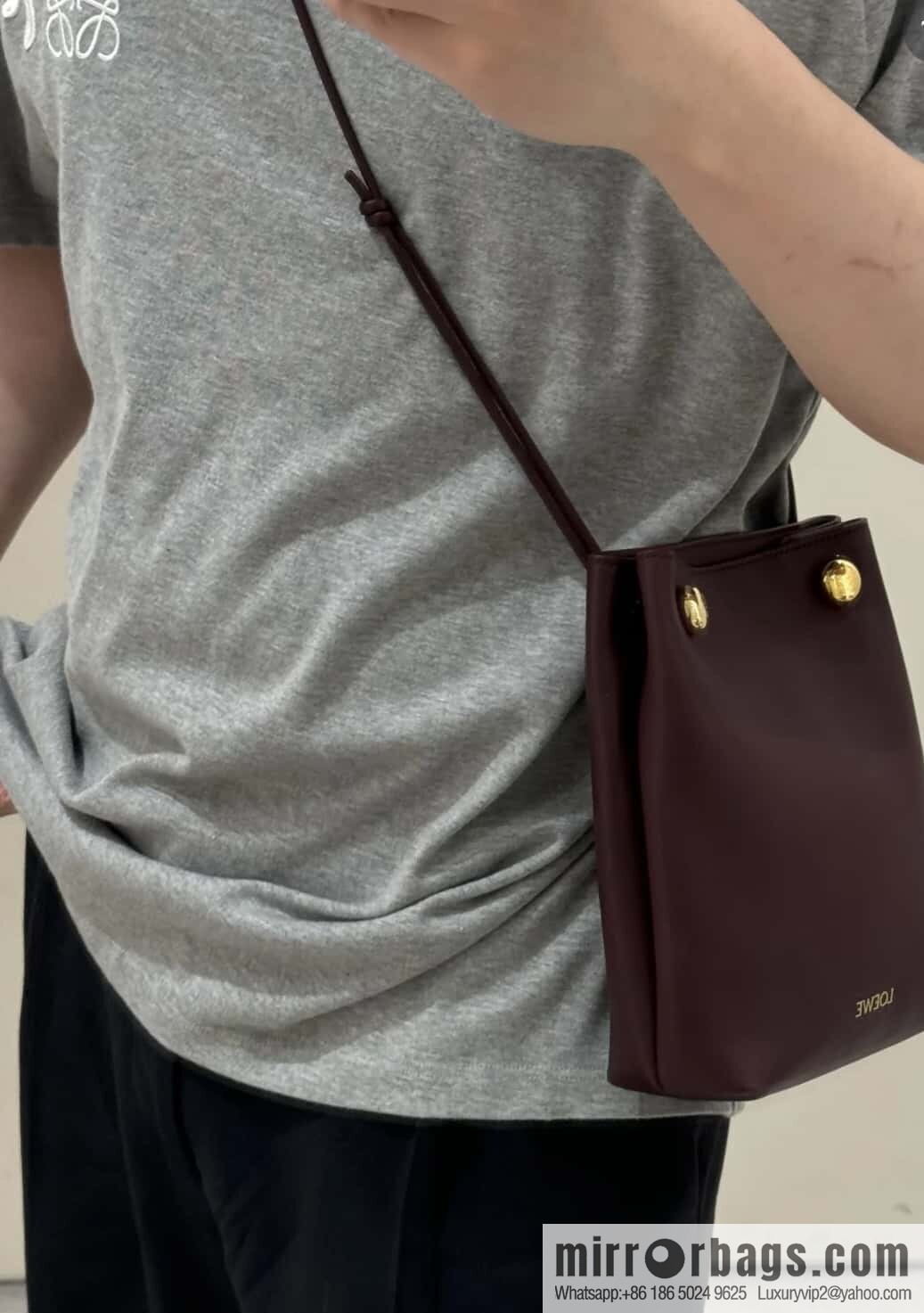 LOEWE's new Pebble Pouch 0905 burgundy