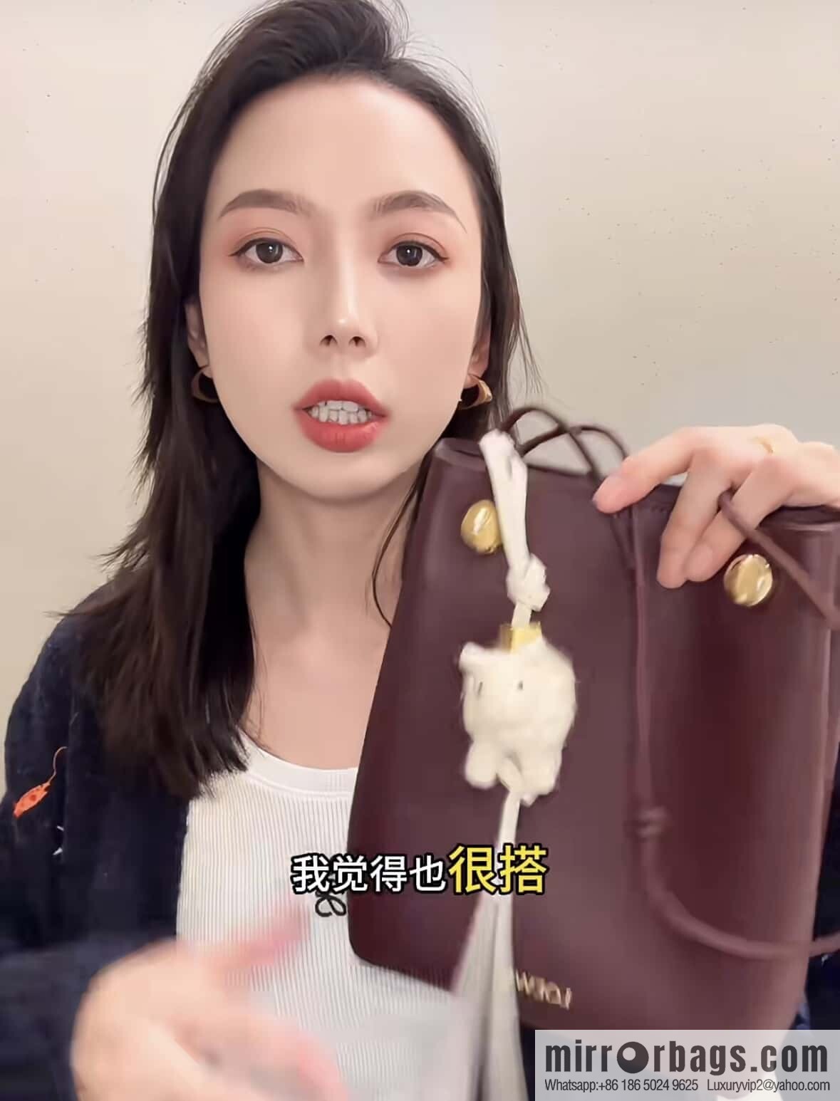 LOEWE's new Pebble Pouch 0905 burgundy
