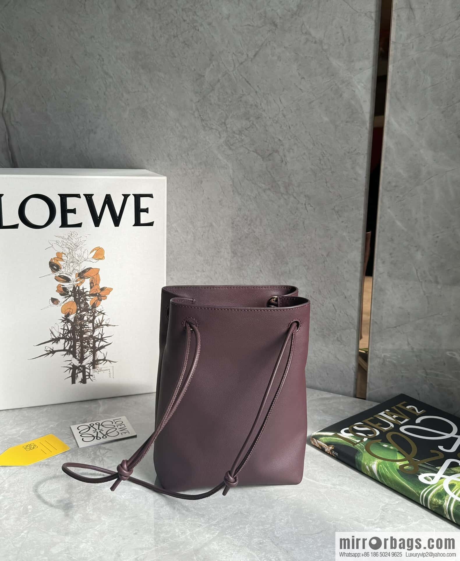 LOEWE's new Pebble Pouch 0905 burgundy