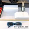 Prada 3D cut temple sunglasses