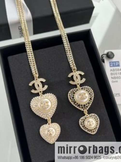 i1662038942_3561_1-800x800vsgsuqdkmo47554_20250716000308.jpg New ☑️ Chanel double c peach heart black and white diamond necklace