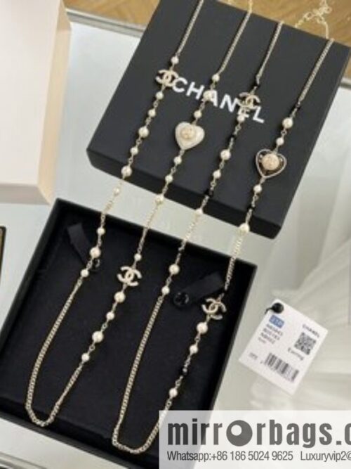 i1662040639_9484_1-800x800r0f53y1xmel7541_20250716000301.jpg New ☑️ Chanel double c peach heart black and white diamond sweater chain necklace