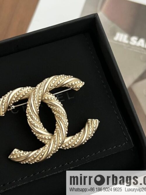 Chanel gold double c brooch