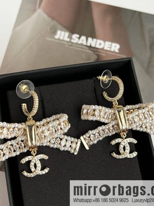 wsxc1669028602187_0-800x800xwthpho34gm205807_20250709071058.jpg New ☑️ Chanel c3 double c bow pearl stud earrings