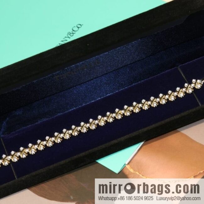 New ☑️ TIFFANY & Co. Tiffany & Co. Color separation cross bracelet