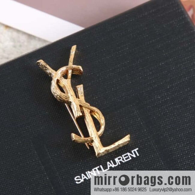 Saint Laurent gold YSL brooch
