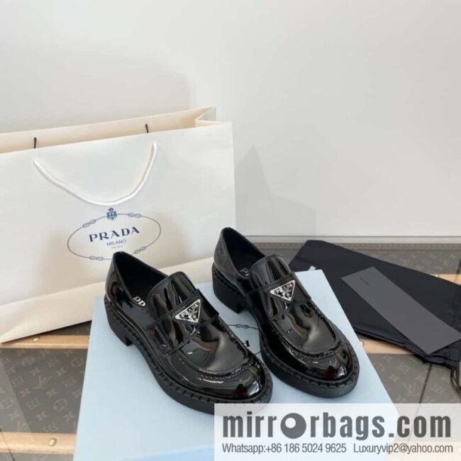 Prada, Puhada glossy patent leather triangle loafers